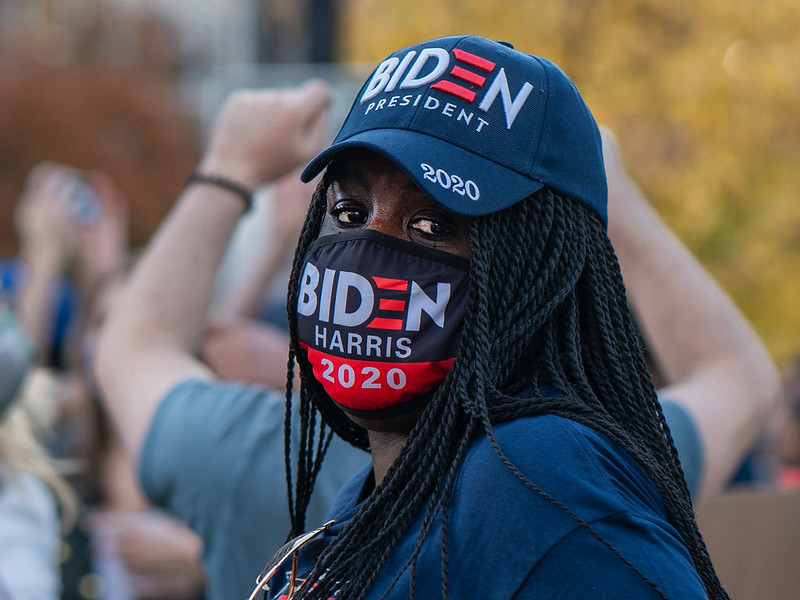 Biden voter with a biden/harris face mask